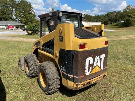 cat 246 skid steer bucket problems